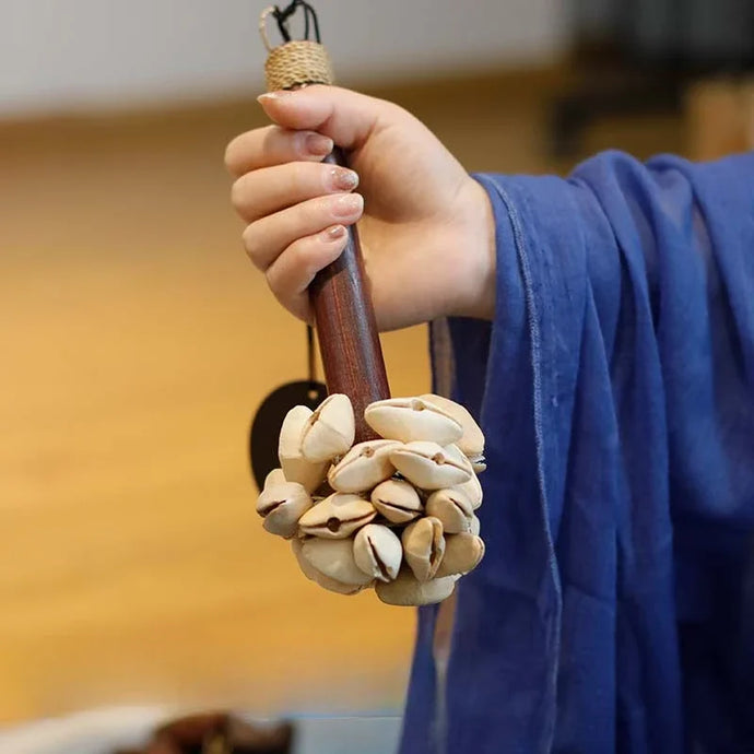 Natural Kenari/ Pala Nut Shell Bell Stick